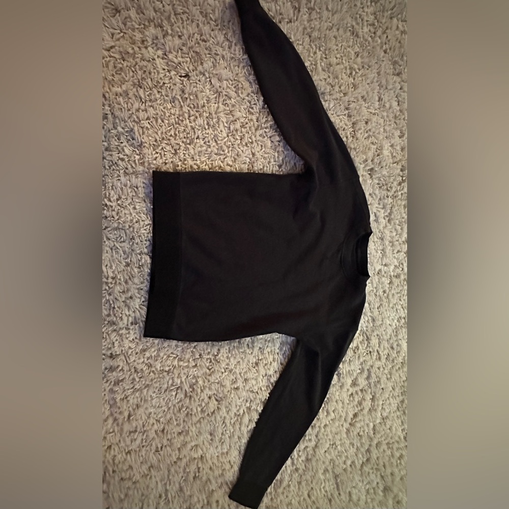 Black Lululemon crewneck with band at the bottom